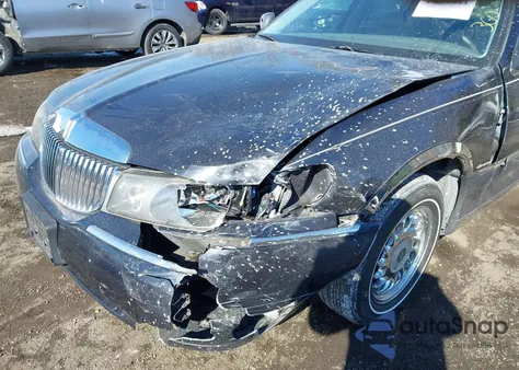 2000 Lincoln Town Car Executive из США, поврежденный, VIN 1LNHM81W7YY797025